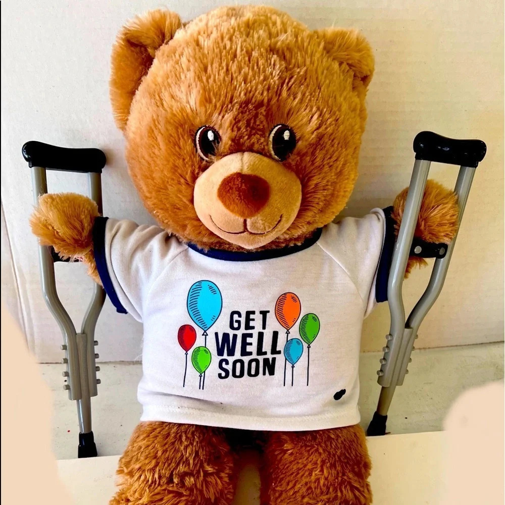 Build-A-Bear “get well soon” light brown bear with crutches!!  Balloons on shirt